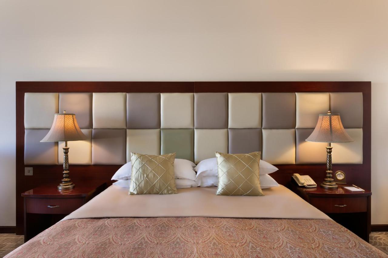 Grand Hotel Excelsior Floriana Exterior photo A bed with a headboard